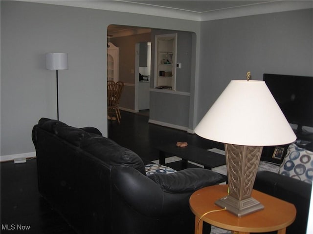 4106 Colony Rd, South Euclid, OH 44121 - living area with baseboards and arched walkways