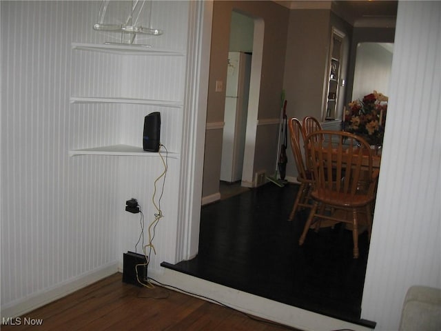 4106 Colony Rd, South Euclid, OH 44121 - dining area with wood finished floors and arched walkways