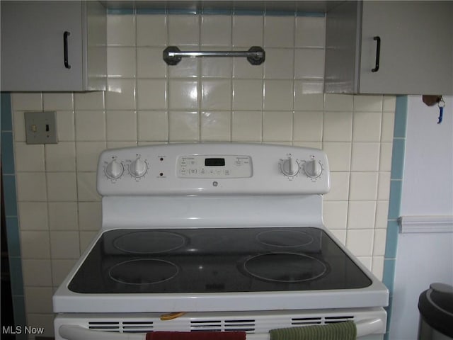 4106 Colony Rd, South Euclid, OH 44121 - kitchen view of electric range and decorative backsplash
