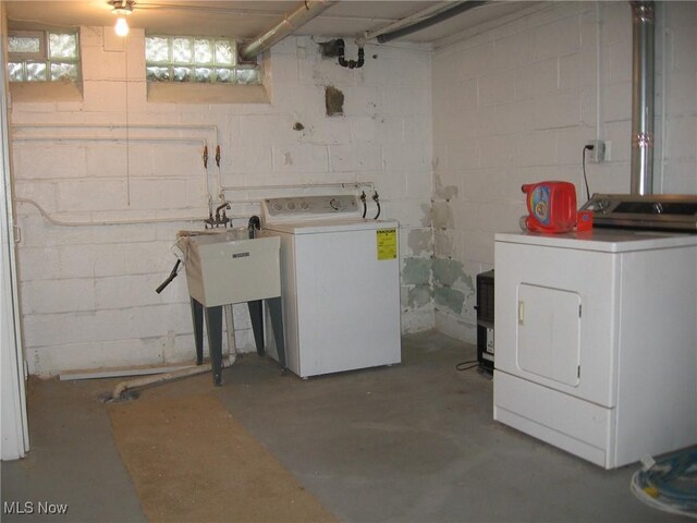 4106 Colony Rd, South Euclid, OH 44121 - below grade area featuring separate washer and dryer and a sink
