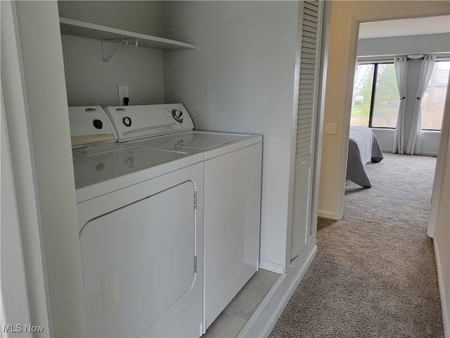 1110 By The Shores Dr, Huron, OH 44839 - washroom with washer and dryer, light carpet, and baseboards