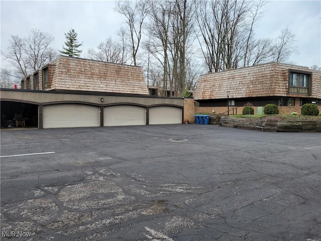 1110 By The Shores Dr, Huron, OH 44839 - view of home's exterior featuring mansard roof