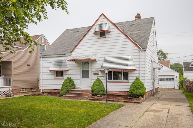 7428 Ira Ave, Brooklyn, OH 44144 - view of front of house featuring a front yard, roof with shingles, a garage, an outbuilding, and a chimney