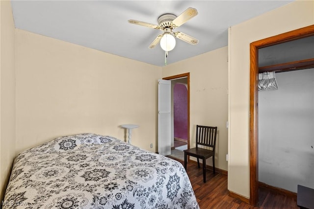 157 W 45th St, Shadyside, OH 43947 - bedroom with dark wood-style floors, a closet, baseboards, and a ceiling fan
