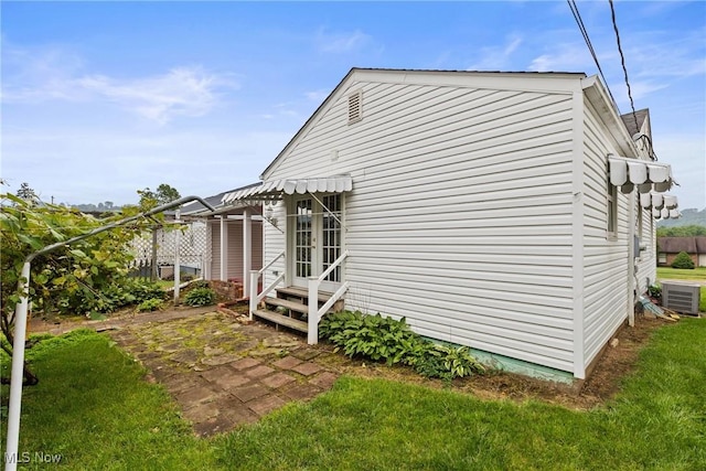 157 W 45th St, Shadyside, OH 43947 - view of side of home featuring entry steps, central AC, and french doors