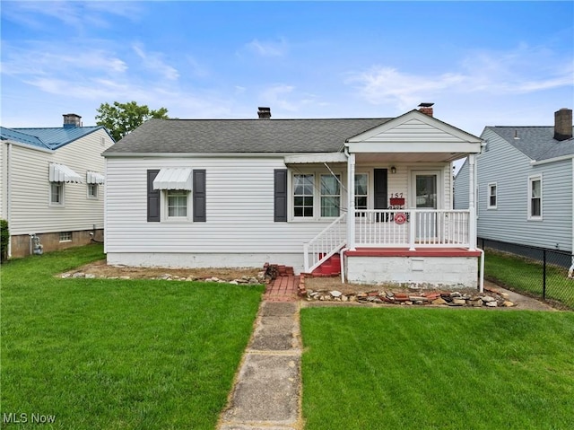 157 W 45th St, Shadyside, OH 43947 - bungalow-style home featuring a porch and a shingled roof