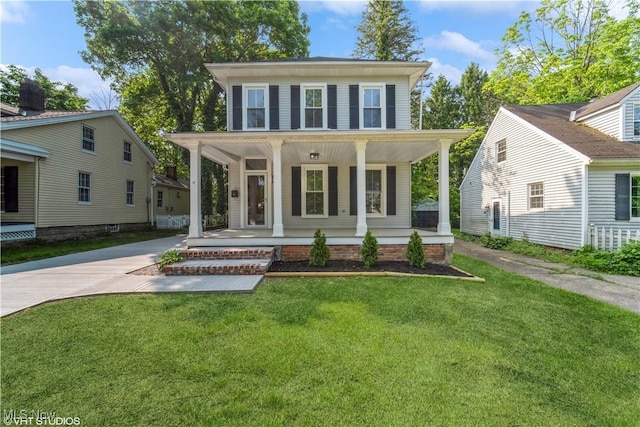 190 Columbus St, Chagrin Falls, OH 44022 - view of front of home featuring a porch and a front lawn