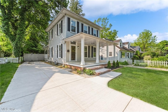 190 Columbus St, Chagrin Falls, OH 44022 - view of front of home featuring covered porch and concrete driveway