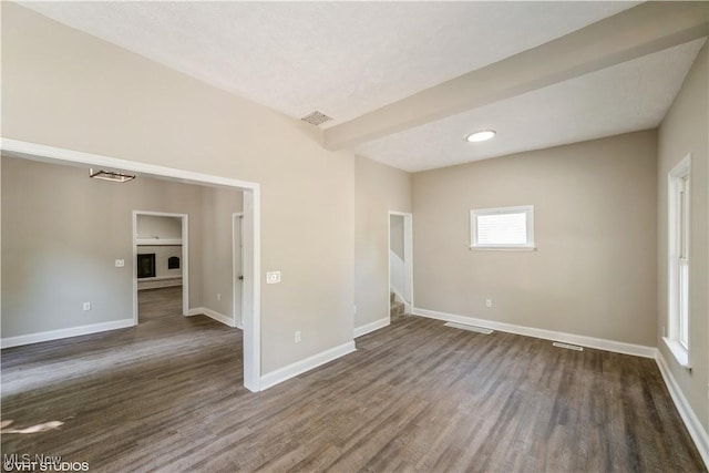190 Columbus St, Chagrin Falls, OH 44022 - spare room featuring dark wood-style flooring, baseboards, and stairway