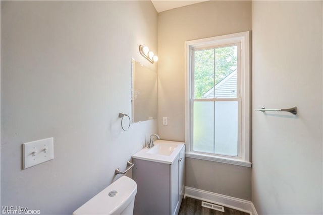 190 Columbus St, Chagrin Falls, OH 44022 - half bathroom featuring toilet, vanity, and baseboards