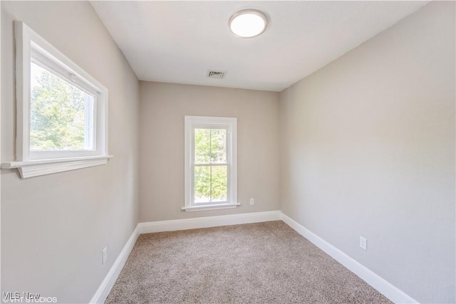190 Columbus St, Chagrin Falls, OH 44022 - carpeted empty room with baseboards