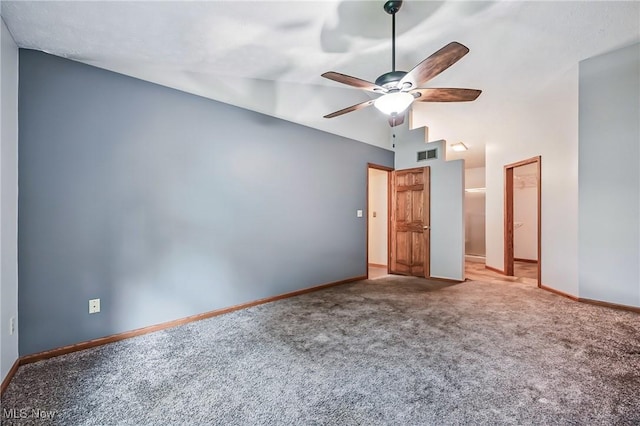 9233 Cain Dr NE, Warren, OH 44484 - unfurnished bedroom with carpet, baseboards, lofted ceiling, and ceiling fan