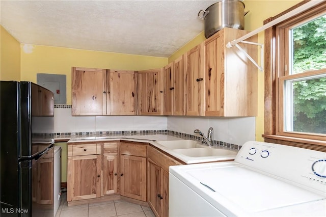 5081 Middle Ridge Rd, Perry, OH 44081 - laundry area with washer / dryer, light tile patterned flooring, and electric panel