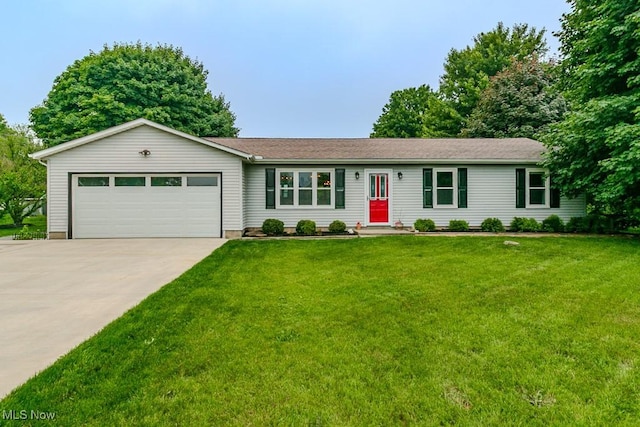 5081 Middle Ridge Rd, Perry, OH 44081 - single story home featuring a garage, driveway, and a front lawn