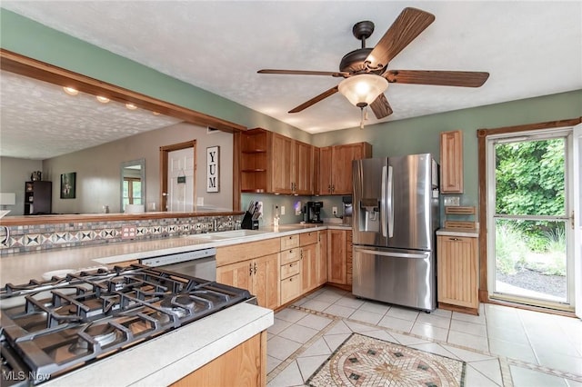 5081 Middle Ridge Rd, Perry, OH 44081 - kitchen featuring stainless steel fridge with ice dispenser, light tile patterned floors, light countertops, open shelves, and a ceiling fan
