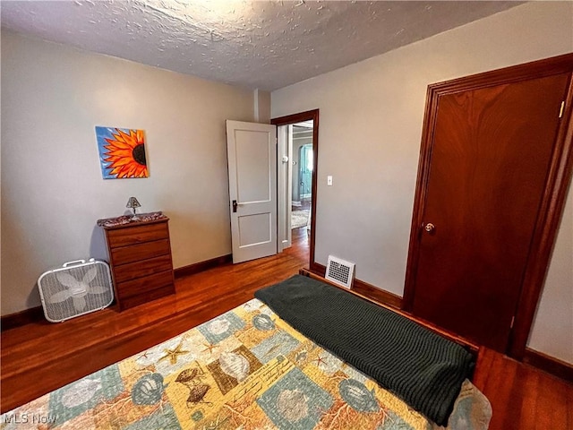 31 Marlindale Ave, Boardman, OH 44512 - bedroom featuring wood finished floors, baseboards, and a textured ceiling