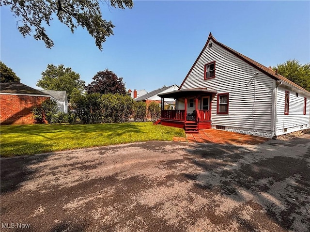 31 Marlindale Ave, Boardman, OH 44512 - view of front of property with a front yard and covered porch