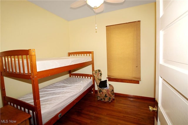 1201 E 3rd St, Port Clinton, OH 43452 - bedroom with wood finished floors, baseboards, and a ceiling fan