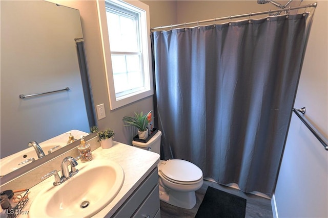 8224 Lilly Ln, Concord, OH 44077 - full bath featuring vanity, toilet, and a shower with shower curtain