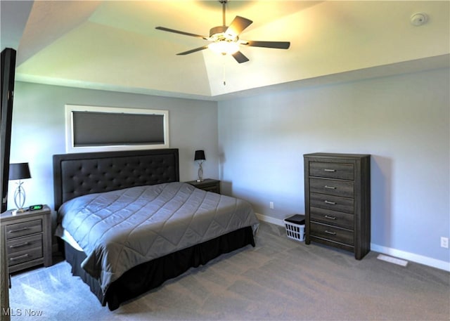 8224 Lilly Ln, Concord, OH 44077 - carpeted bedroom featuring baseboards, vaulted ceiling, and ceiling fan