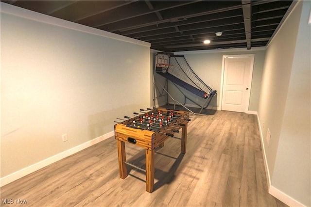 8224 Lilly Ln, Concord, OH 44077 - playroom with baseboards and wood finished floors