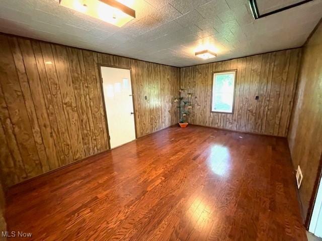 48555 Calcutta Smithferry Rd, East Liverpool, OH 43920 - empty room featuring wood finished floors and wooden walls