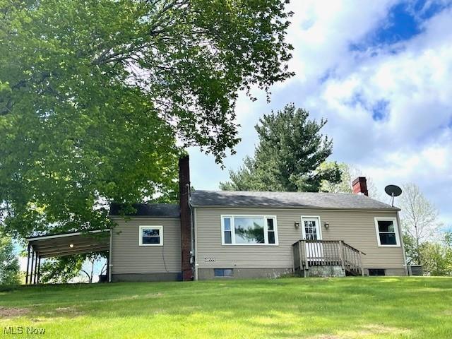 48555 Calcutta Smithferry Rd, East Liverpool, OH 43920 - back of property with a chimney and a yard
