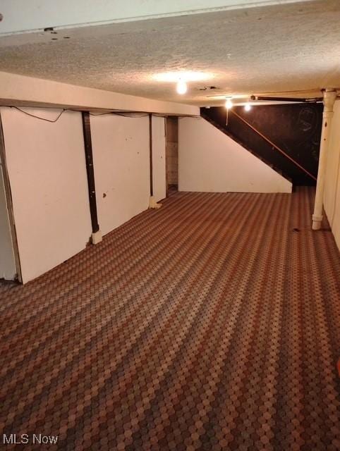 772 Shoshone Ave, Akron, OH 44305 - finished basement featuring carpet flooring and a textured ceiling