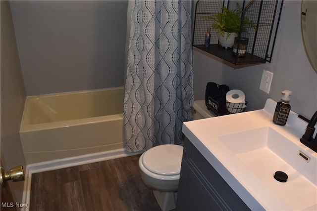 1408 N 9th St, Martins Ferry, OH 43935 - bathroom with toilet, wood finished floors, vanity, and shower / bath combination with curtain