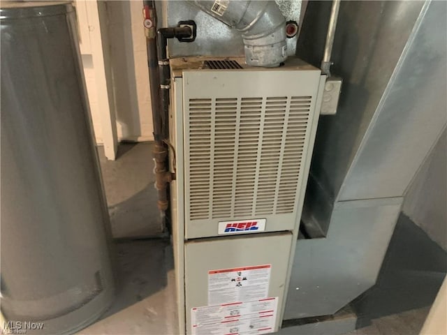 3961 E 53rd St, Newburgh Heights, OH 44105 - utilities featuring water heater and heating unit