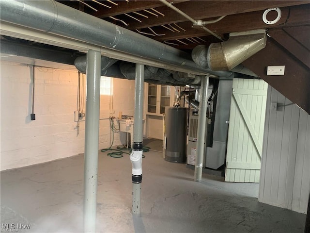 3961 E 53rd St, Newburgh Heights, OH 44105 - unfinished below grade area featuring water heater and heating unit