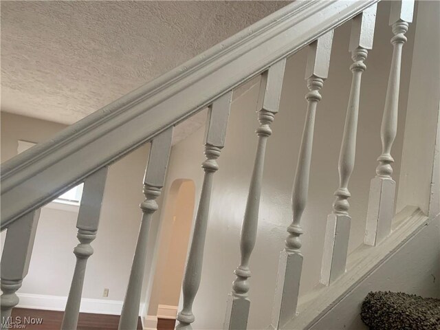 3961 E 53rd St, Newburgh Heights, OH 44105 - detailed view of a textured ceiling and baseboards