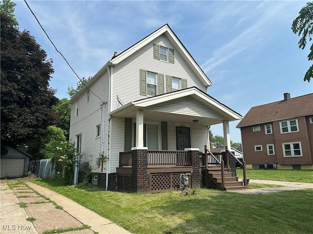 3961 E 53rd St, Newburgh Heights, OH 44105 - american foursquare style home with covered porch and a front lawn