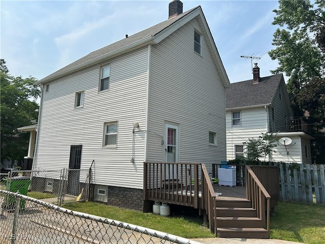 3961 E 53rd St, Newburgh Heights, OH 44105 - rear view of property featuring a chimney and a wooden deck