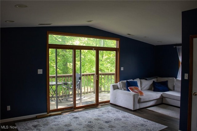 1553 Quail Hollow Dr, Cambridge, OH 43725 - living area featuring vaulted ceiling and wood finished floors
