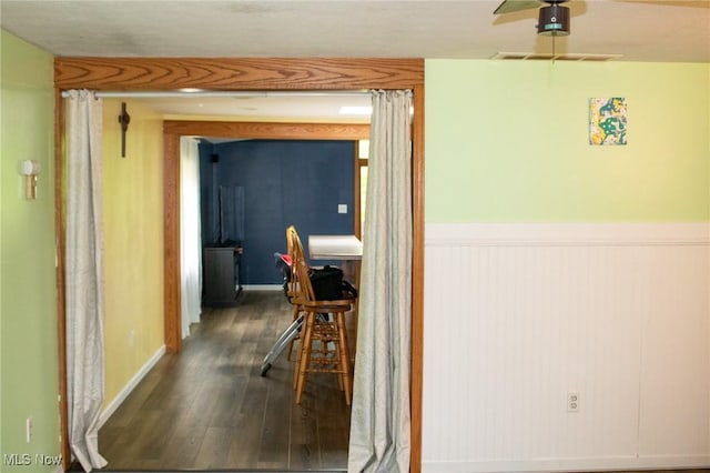 1553 Quail Hollow Dr, Cambridge, OH 43725 - corridor with wood finished floors and a wainscoted wall