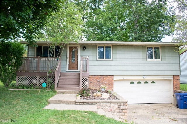 1553 Quail Hollow Dr, Cambridge, OH 43725 - view of front of home featuring driveway, a garage, and a porch