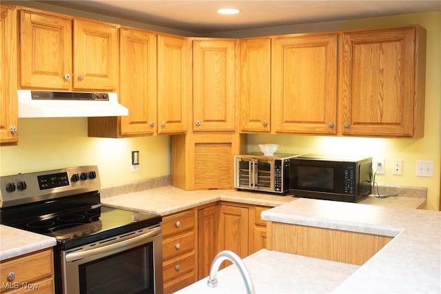 1553 Quail Hollow Dr, Cambridge, OH 43725 - kitchen featuring stainless steel electric range oven, under cabinet range hood, black microwave, light countertops, and recessed lighting