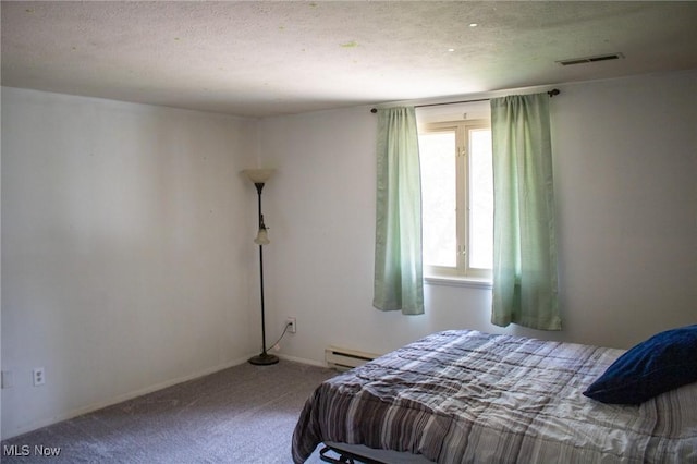 1553 Quail Hollow Dr, Cambridge, OH 43725 - carpeted bedroom with a baseboard radiator