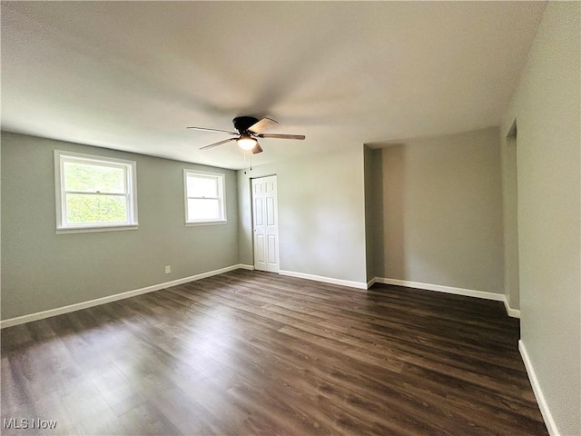 2815 Race Track Rd, New Cumberland, WV 26047 - unfurnished room with dark wood finished floors, ceiling fan, and baseboards