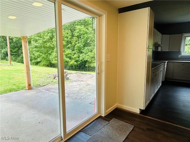 2815 Race Track Rd, New Cumberland, WV 26047 - doorway to outside featuring dark wood finished floors and baseboards