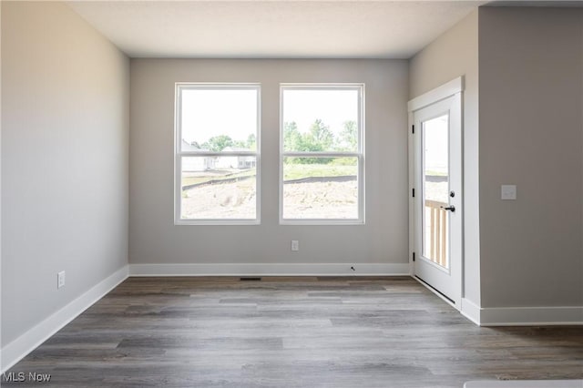 3730 Overlook Ct, Akron, OH 44333 - empty room featuring healthy amount of natural light and wood finished floors