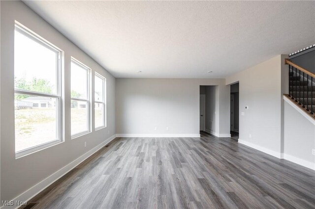 3730 Overlook Ct, Akron, OH 44333 - empty room with stairs and wood finished floors