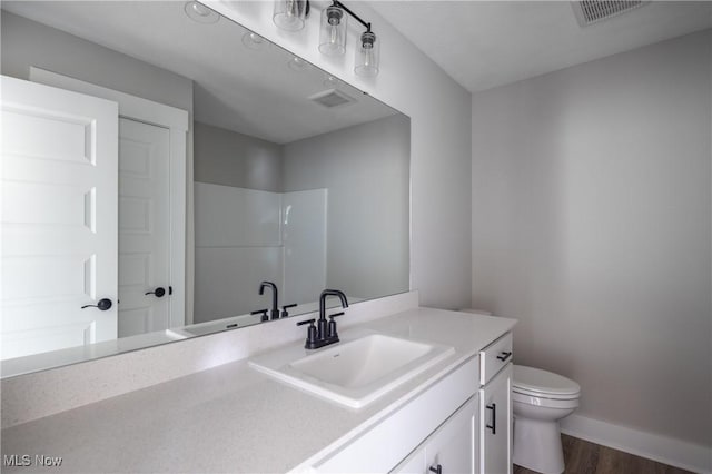 3730 Overlook Ct, Akron, OH 44333 - bathroom featuring wood finished floors, vanity, and a shower