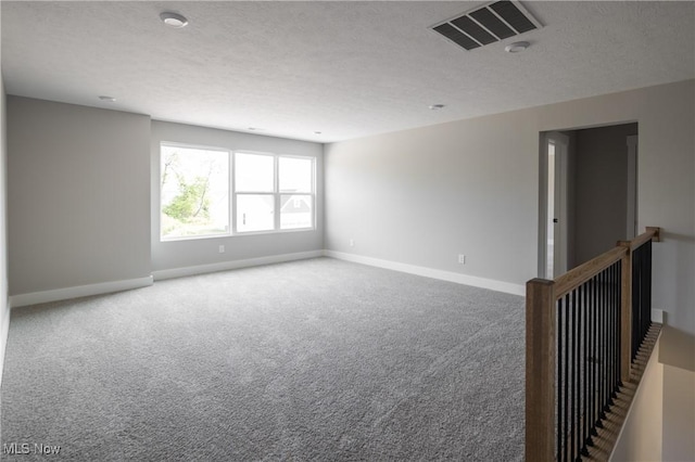 3730 Overlook Ct, Akron, OH 44333 - carpeted spare room with baseboards and a textured ceiling