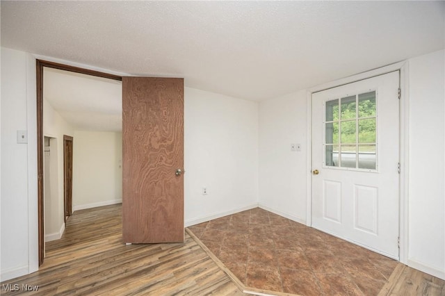 15295 State Route 60, Lowell, OH 45744 - empty room featuring wood finished floors