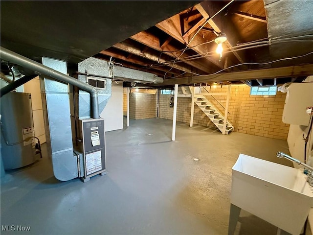 3427 Elm St, Weirton, WV 26062 - below grade area featuring gas water heater, stairway, and heating unit