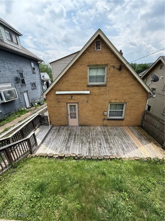 3427 Elm St, Weirton, WV 26062 - back of property with brick siding and a deck