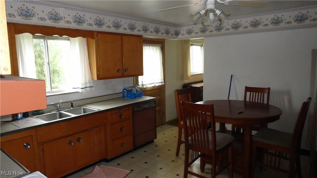 521 Georgia Ave, Chester, WV 26034 - kitchen with dishwasher, a sink, ceiling fan, brown cabinets, and light floors