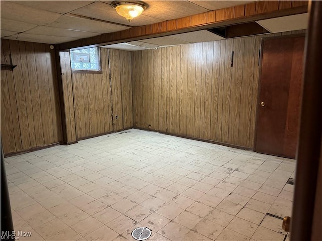 615 Noah Ave, Akron, OH 44320 - basement with wooden walls and light floors